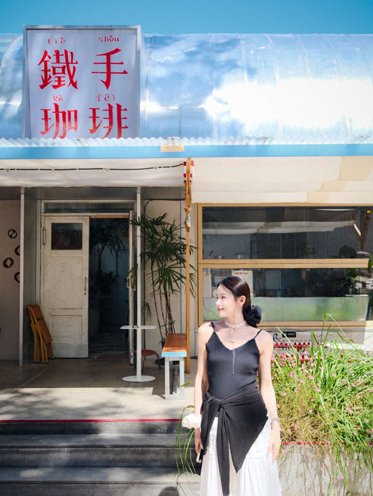 Photo by Iron Hand Coffee (Friendship Garden Store) - In front of the store's signboard