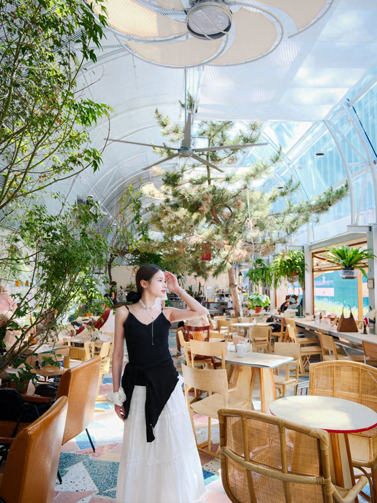 Photo by Tie Shou Coffee (Youyi Garden Store) - Colorful Tile Floor Dining Table