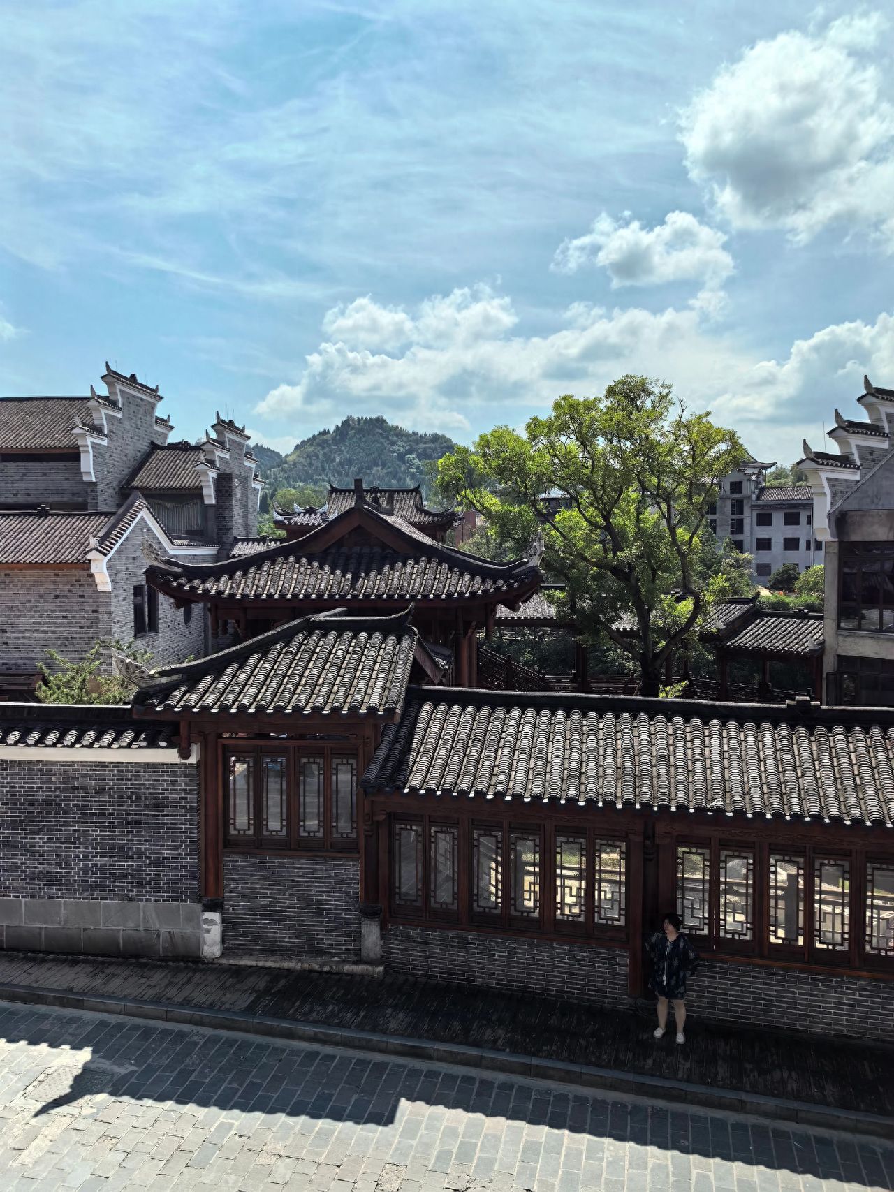 Photo by Biancheng Chameng Scenic Area - Ancient Town Architectural Complex and Mountain Views