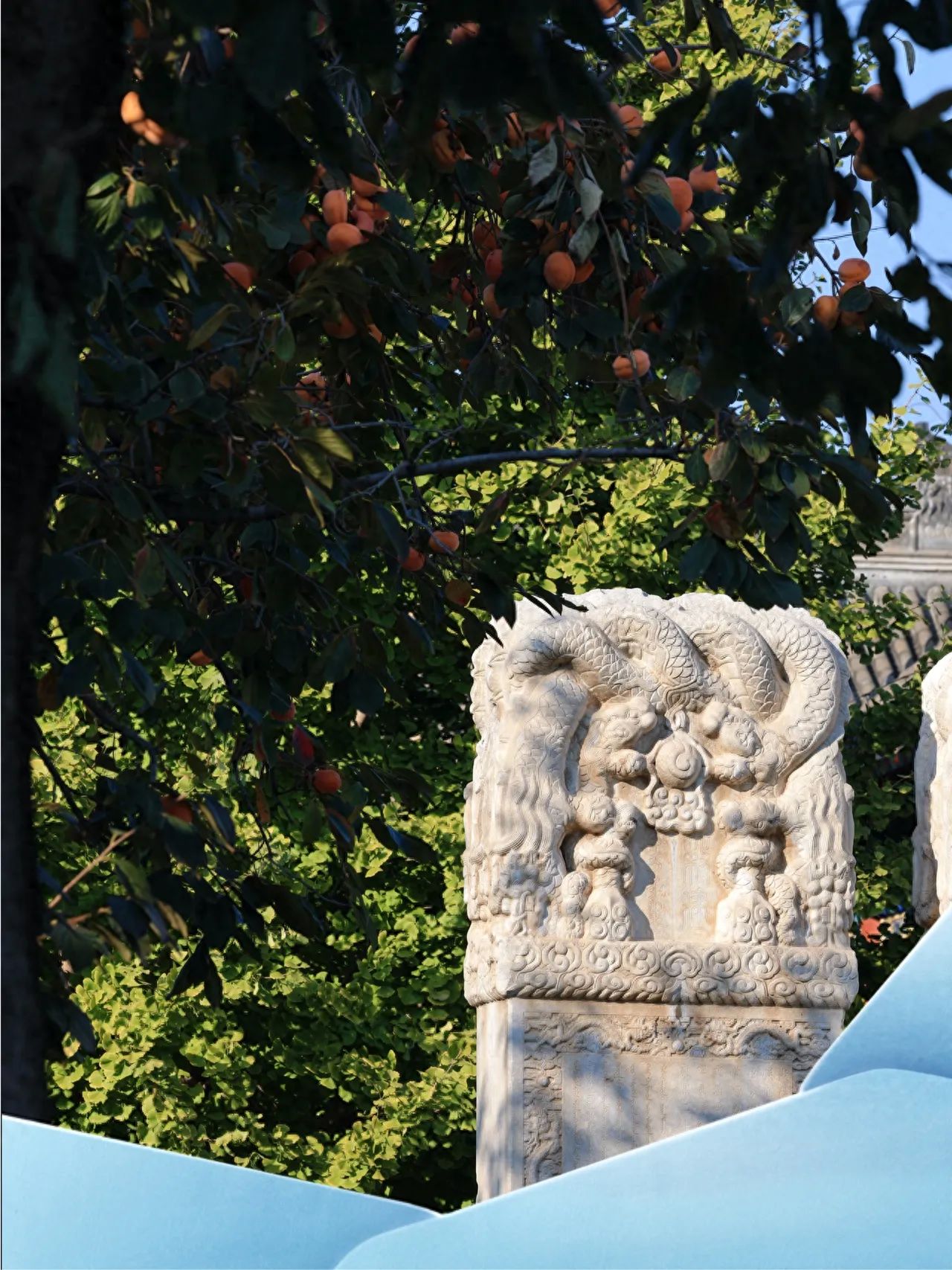 Photo by Beijing Stone Carving Art Museum - Stone Pillars and Persimmon Trees