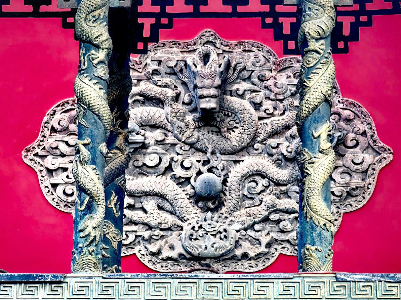 Photo by Fragrance Hill Park Biyun Temple - Red walls with dragon columns and dragon pattern reliefs