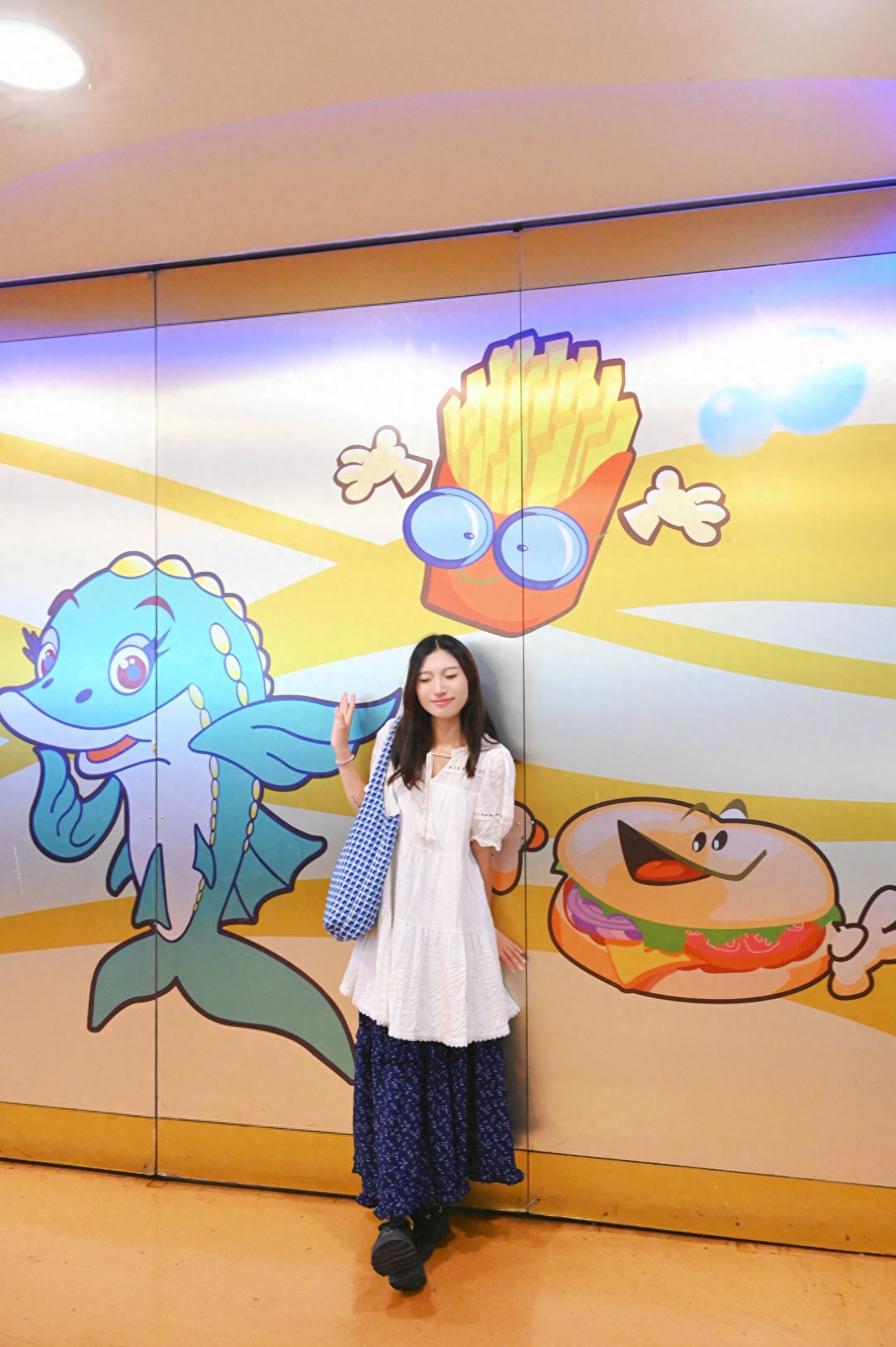Photo by Beijing Aquarium - Mural of Dolphins and French Fries Burgers