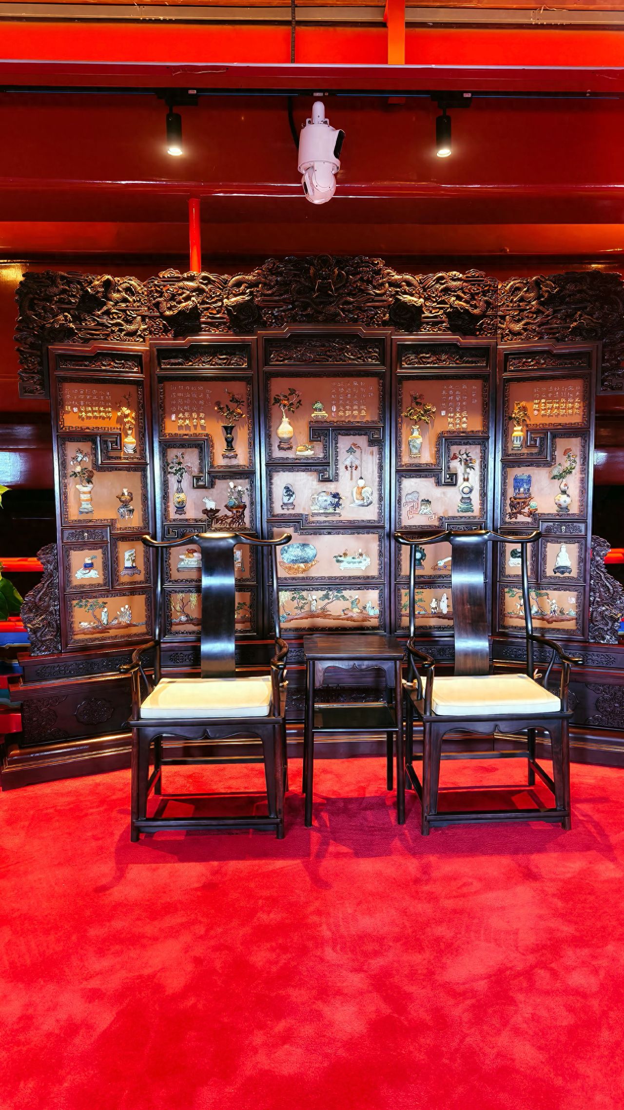 Photo by Zhengyangmen Arrow Tower - Ancient-style screens and seating inside the Arrow Tower