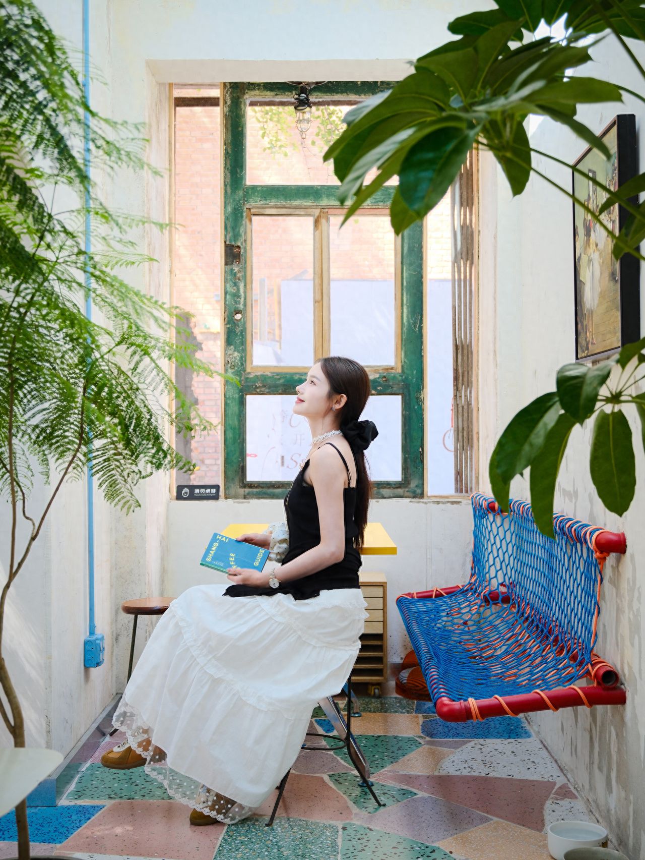 Photo by Tie Shou Coffee (Youyi Garden Store) - Vintage Windows and Wicker Chairs