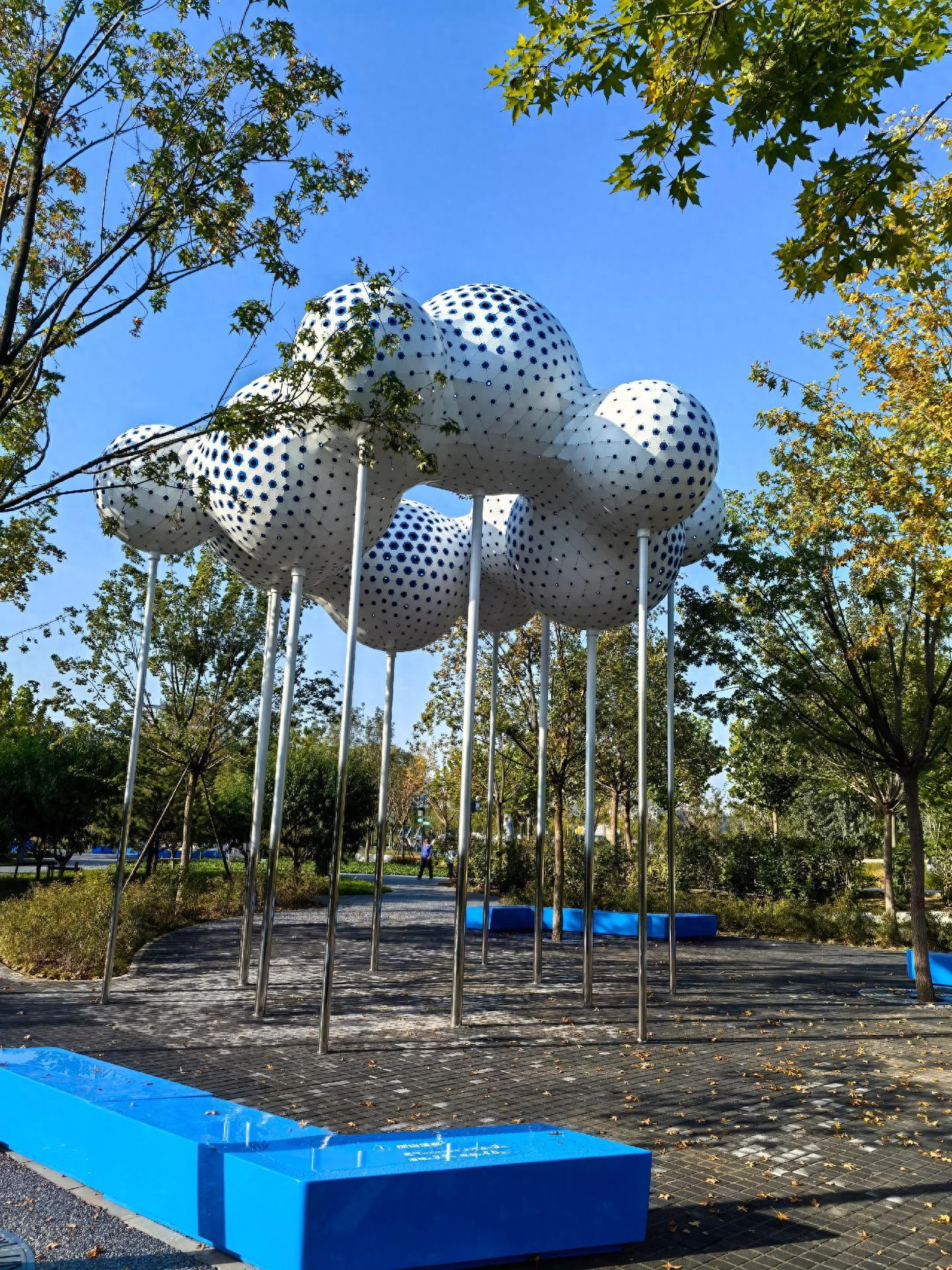 Photo by Wenyu River Park - Spherical Art Installation