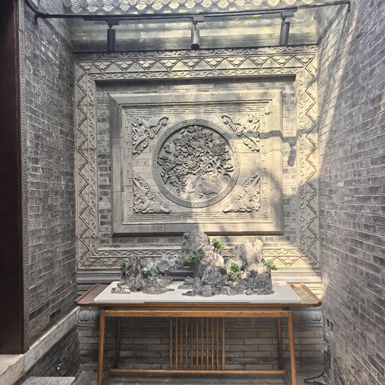 Photo by Qianmen Street in Beijing - Artificial Mountain and Wall Reliefs