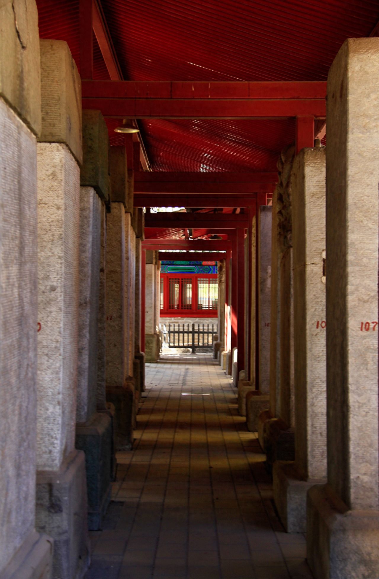 Photo by Confucius Temple and the Imperial Academy Museum - Corridor with Grey Stone Columns