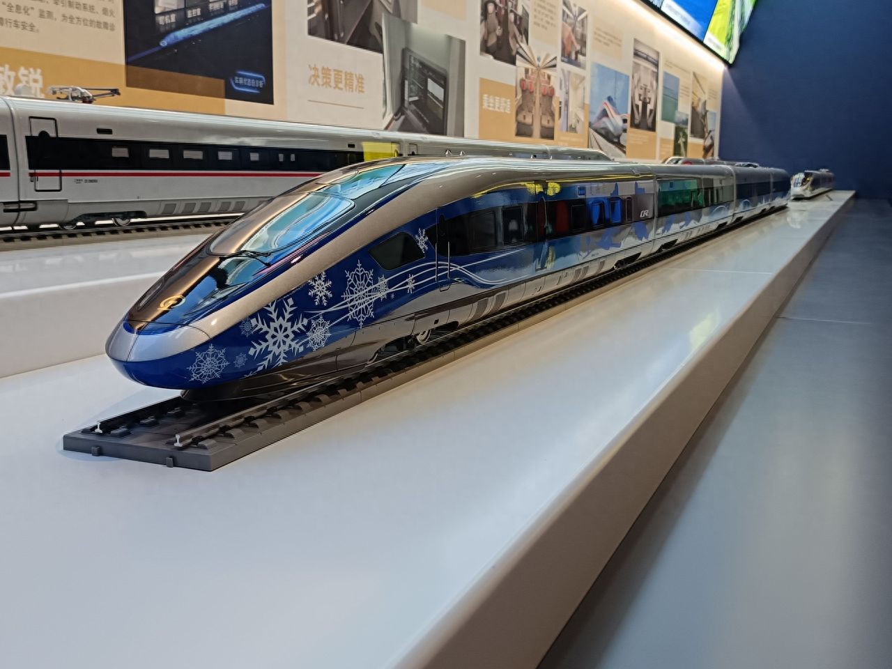 Photo by China Railway Museum - Blue Snowflake High-Speed Train Model Exhibit