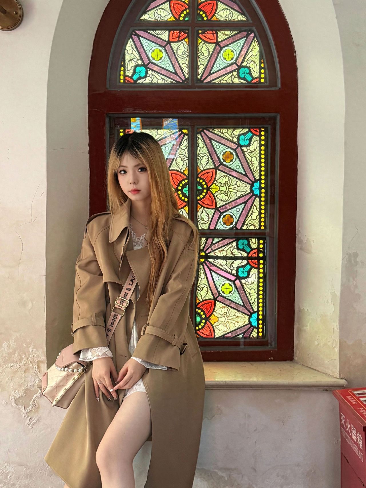 Photo by Xishiku Catholic Church - Take a picture with the stained glass windows.