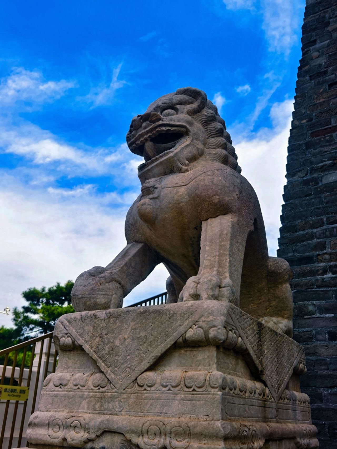 Photo by Zhengyangmen Arrow Tower - Stone Lion Sculpture Stone Wall