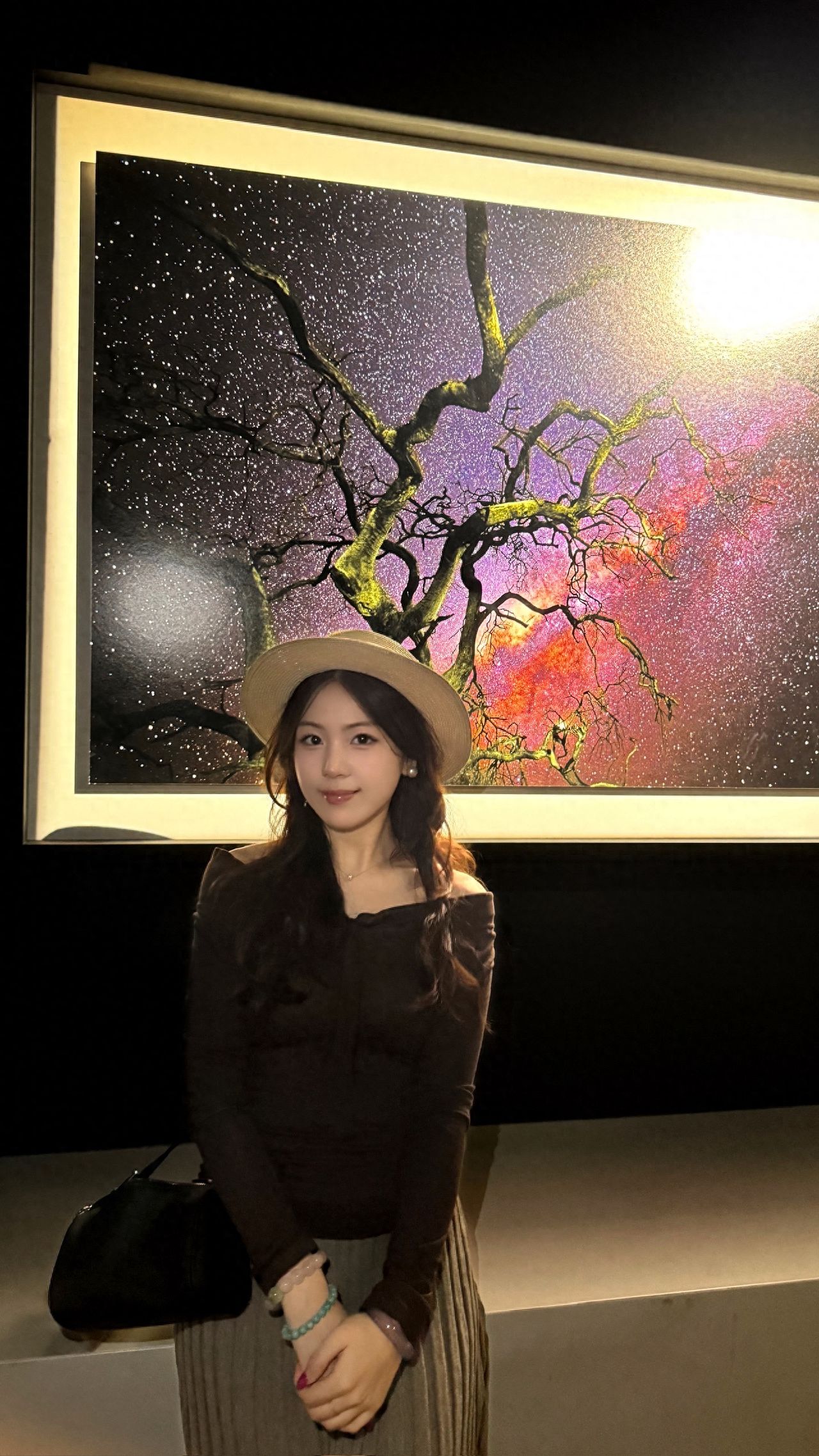 Photo by Luo Hong Photography Art Gallery - Taking Photos with Exhibition Artworks