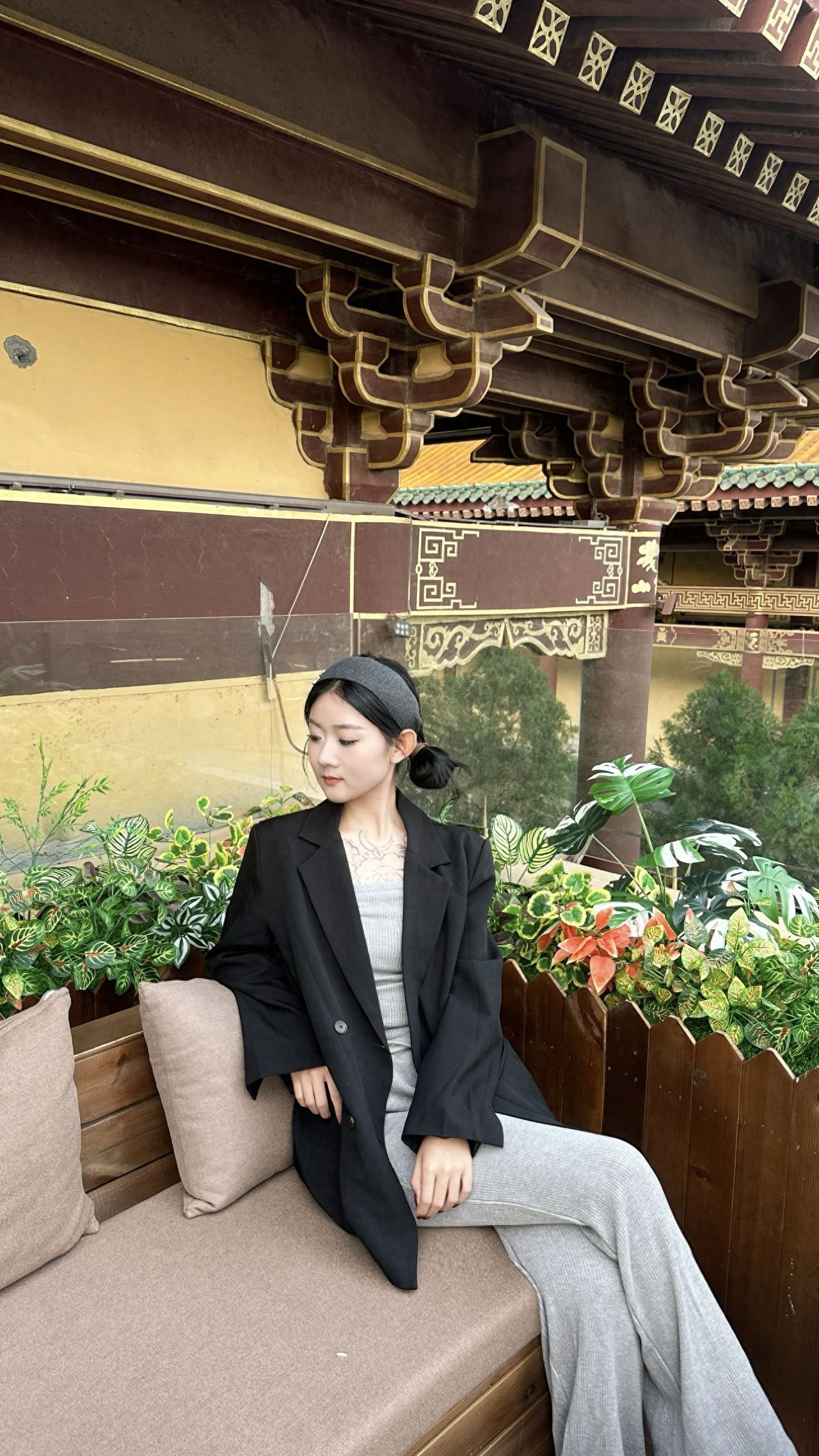 Photo by Beijing Huguo Temple - Taking a photo with temple architecture and benches.
