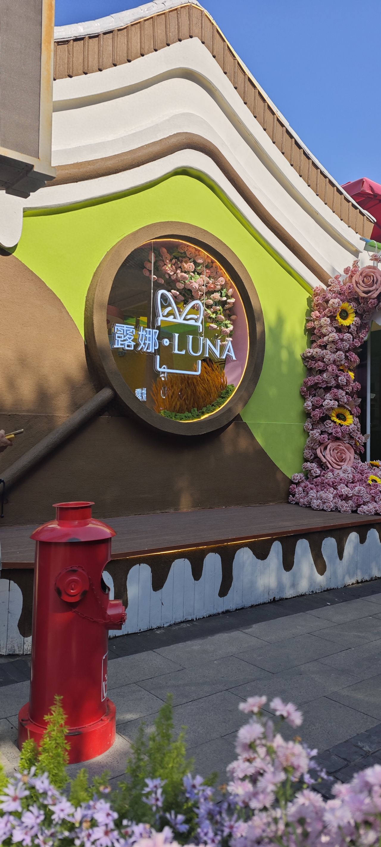 Photo by Lanman Hutong - Luna Shop Sign and Floral Decorations