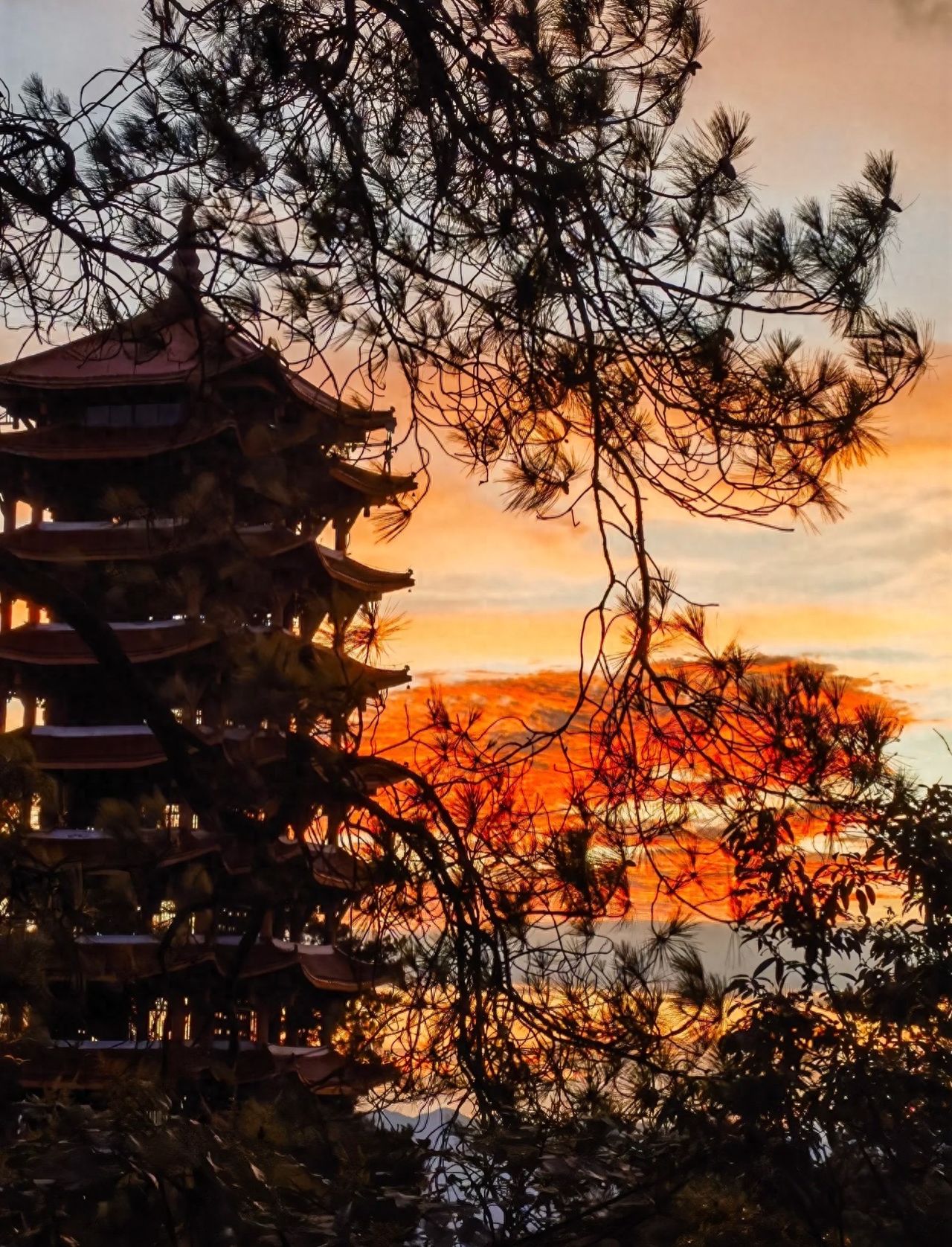 Photo by Jinyun Mountain – Ancient Tower, Pine Trees & Sunset Clouds  