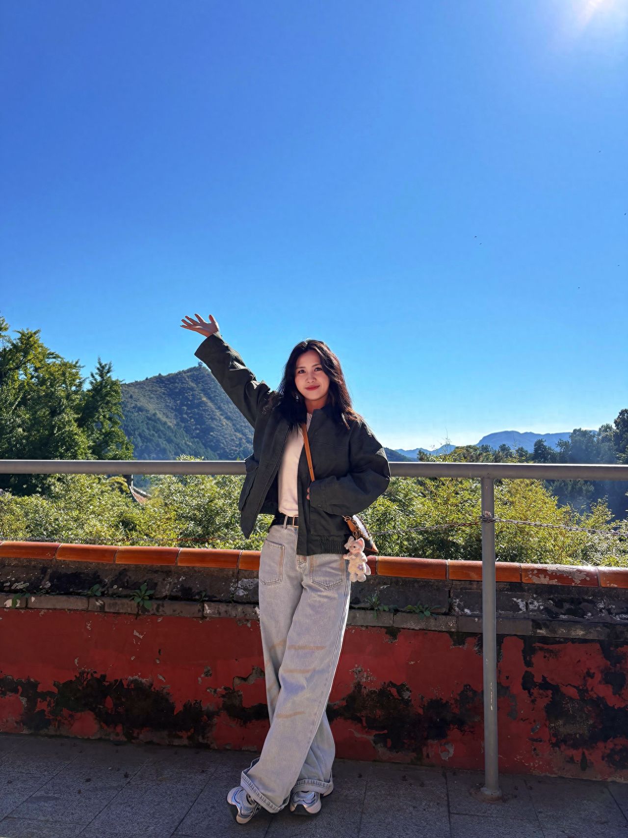 Photo by Beijing Tanzhe Temple - Taking a photo with the scenic overlook railings and the forested hills
