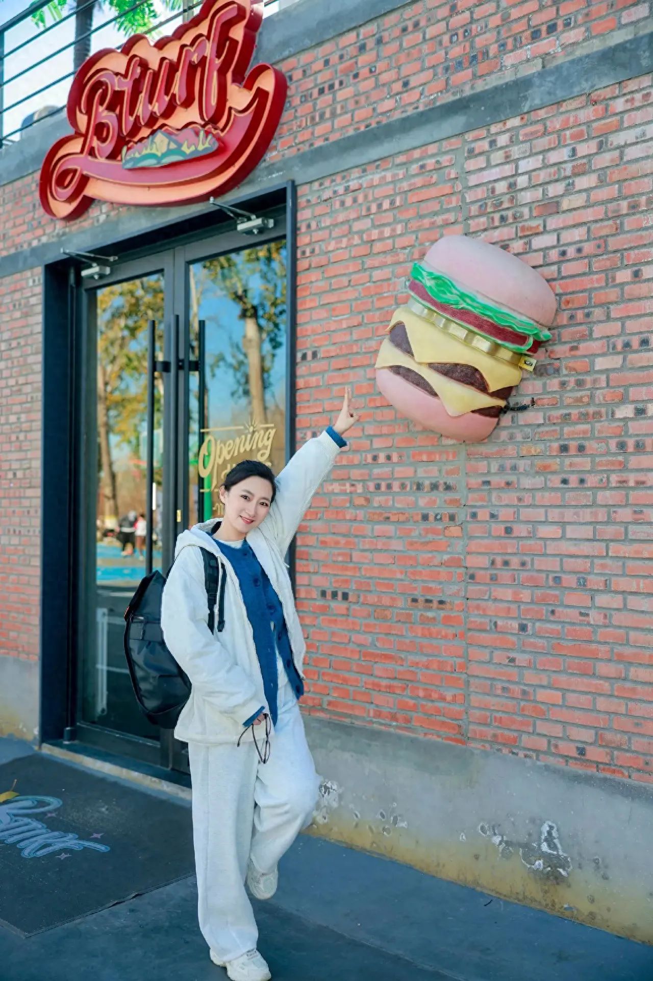 Photo by Langyuan Station - Half a Hamburger Sculpture on the Wall