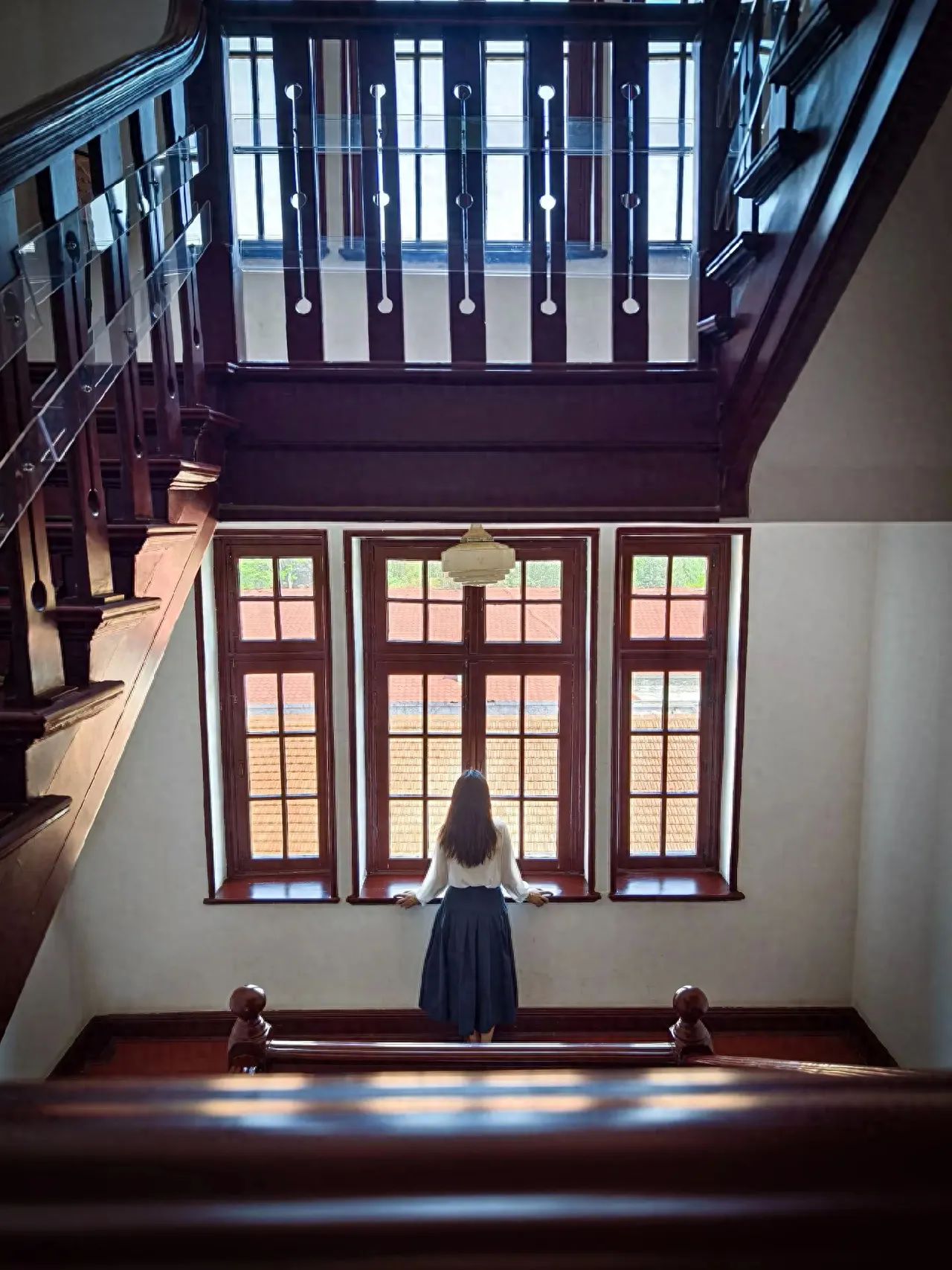 Photo by Beijing May 4th Street - Red Building Staircase Windows of Peking University