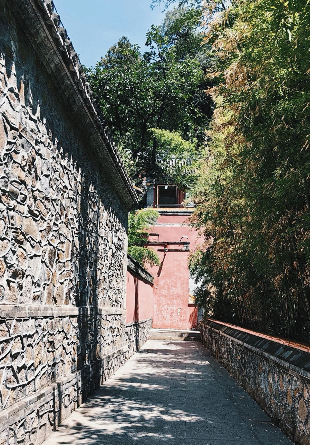 Photo by Tanzhe Temple - Stone Wall Red Wall Architecture and Bamboo Grove Pathway