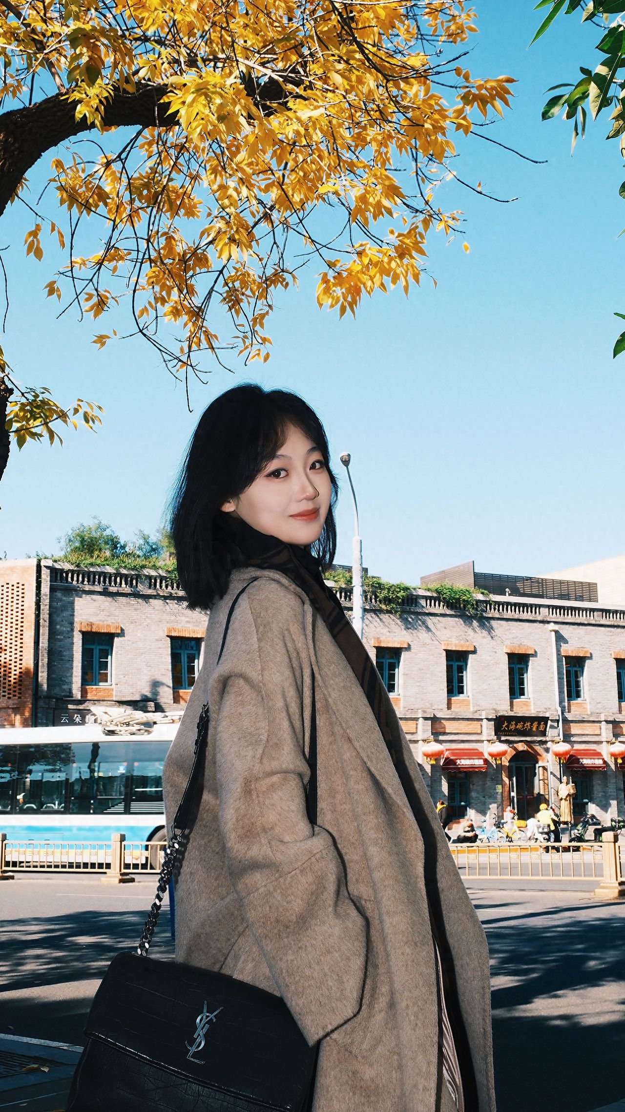 Photo by Beijing Wusi Street - Autumn Trees and Building Plaques