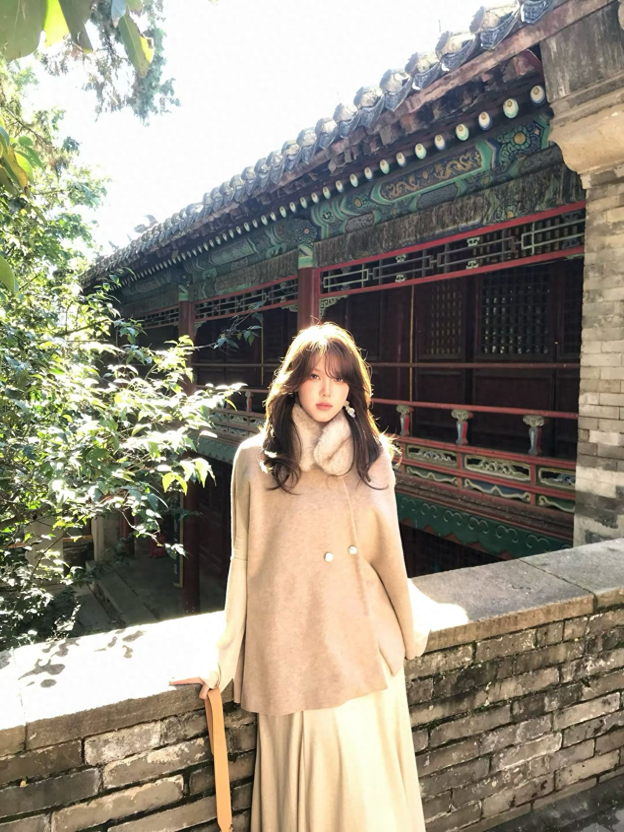 Photo by Tanzhe Temple - Group photo by the stone wall and temple pavilions