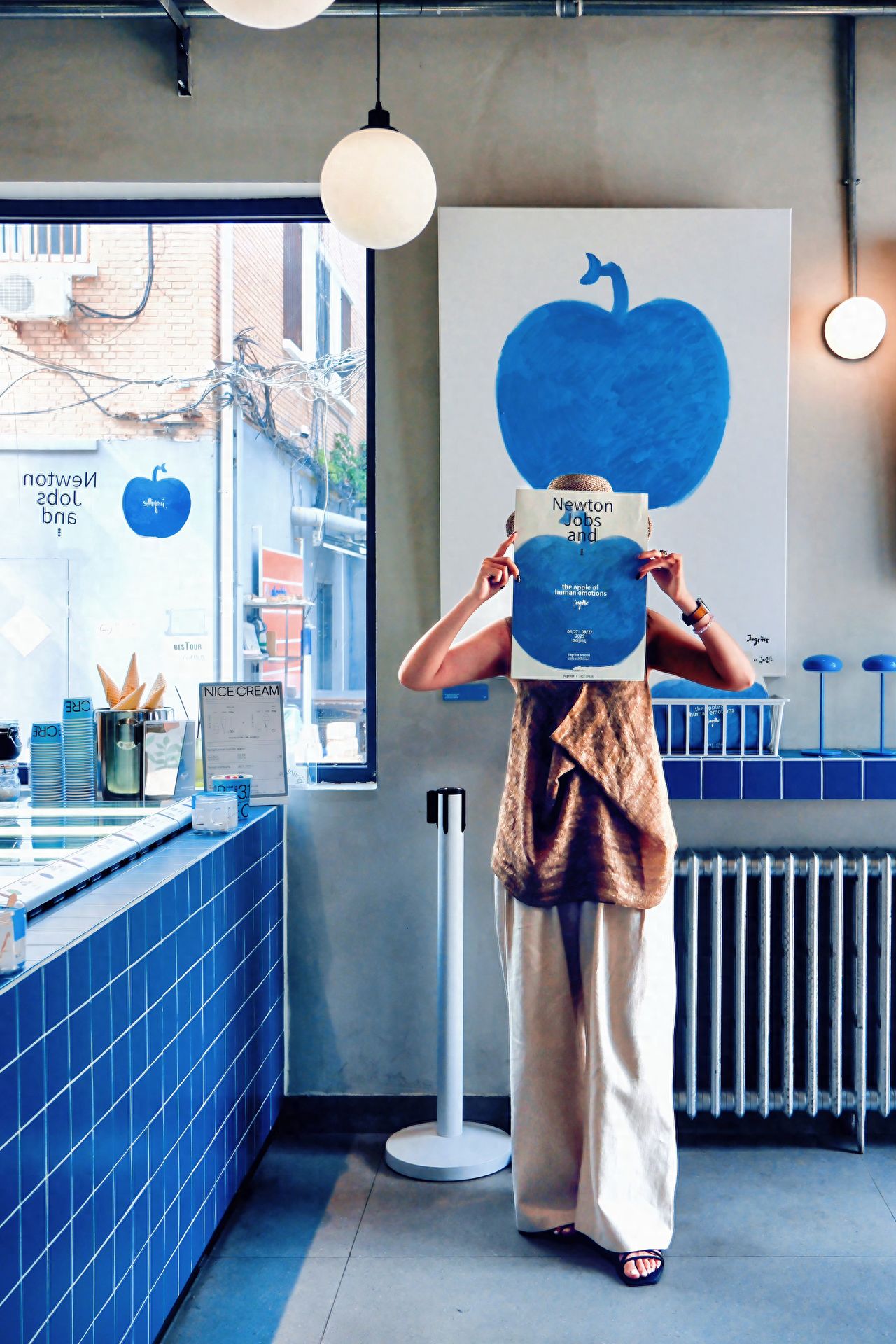 Photo by Beijing Naisi Ice Cream (Friendship Store) - in front of the Blue Apple Poster