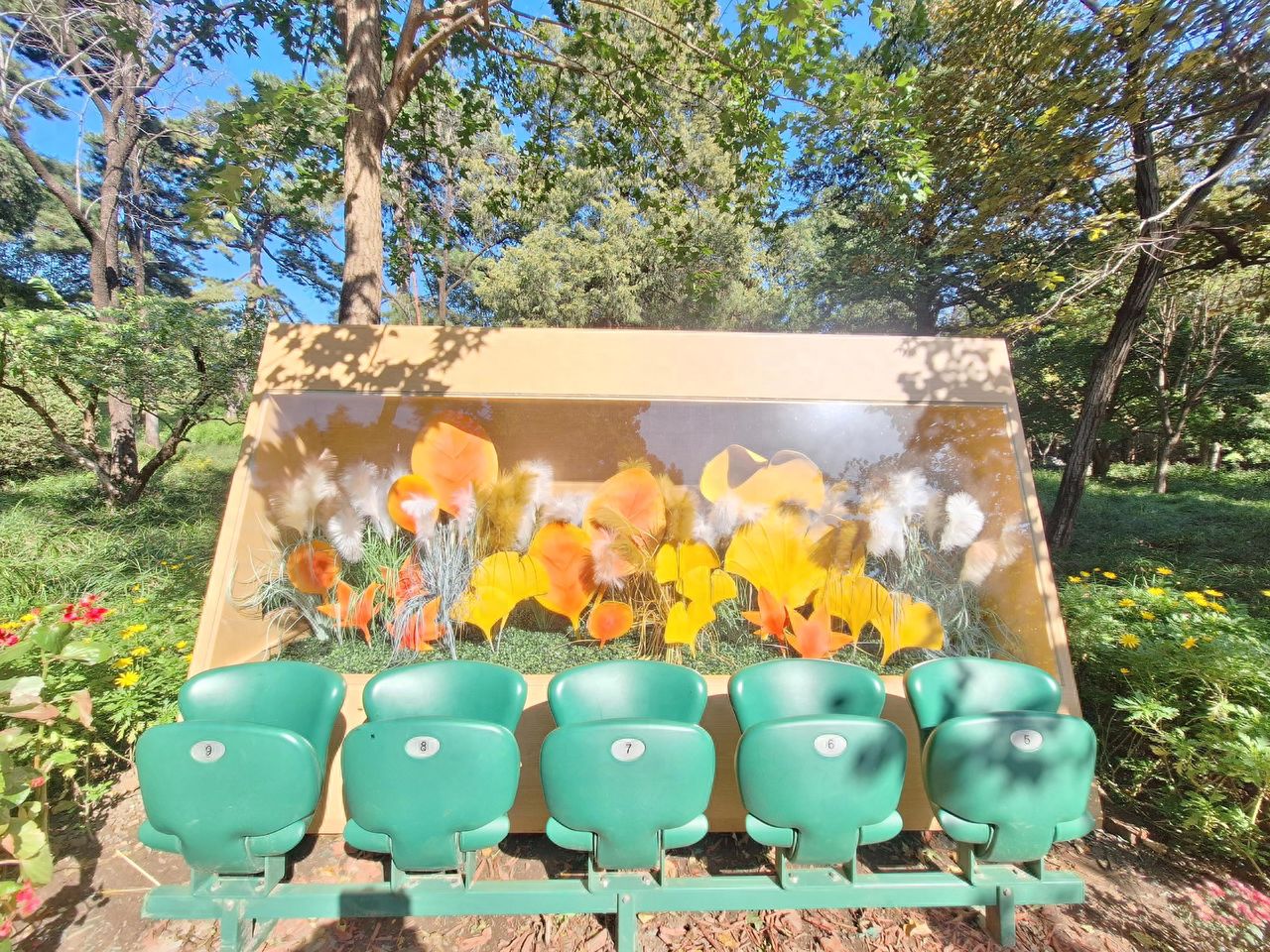 Photo by Beijing Fragrant Hills Park - Floral and Greenery Decorated Benches
