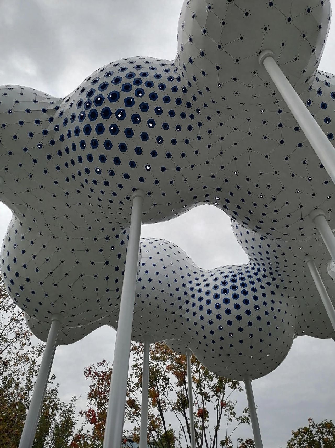 Photo by Wenyu River Park Future Intelligence Valley - Upward Shot of White Art Installation