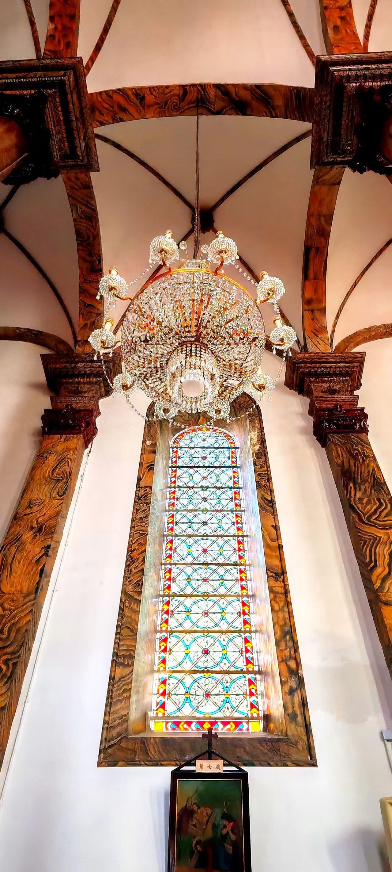 Wangfujing Catholic Church - Stained Glass Windows and Chandelier Architectural Feature — photo spot in Wangfujing Catholic Church, China