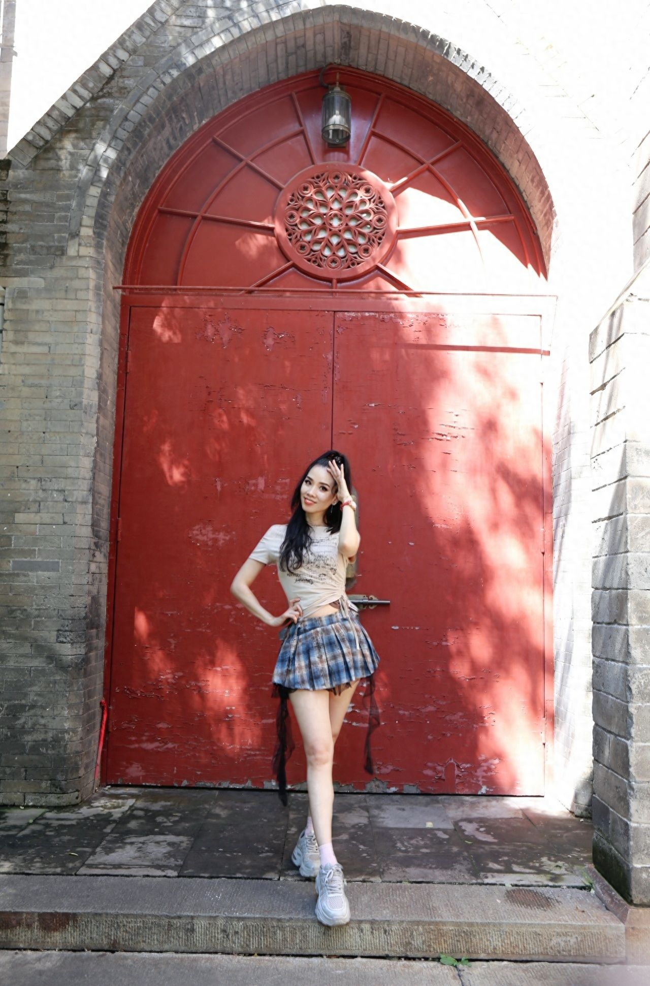 Photo by Xishiku Catholic Church - Take a photo with the red gate brick wall building