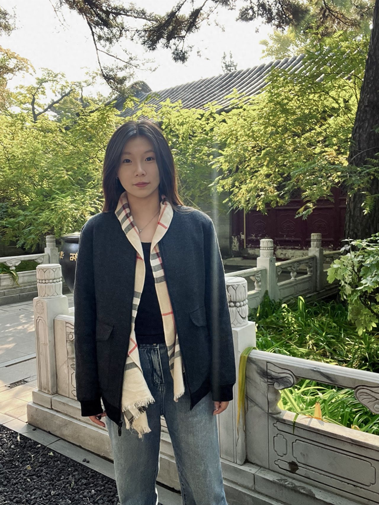 Photo by Tanzhe Temple - Group photos with stone railings, trees, and architecture.
