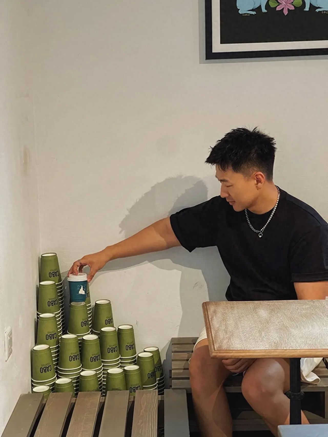 Polonio Coffee - Take a Photo with the Green Coffee Cup Decorations — photo spot in Polonio, China