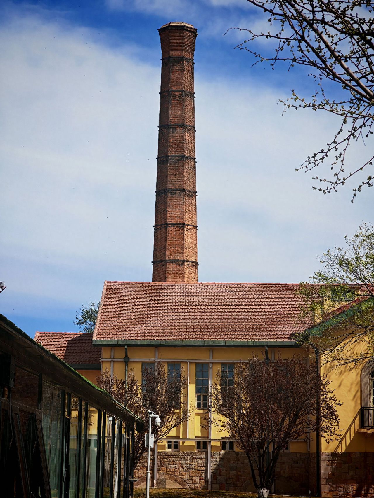 491 Space - Red Tile Yellow Wall Houses and Red Chimneys — photo spot in 491 Space  , China