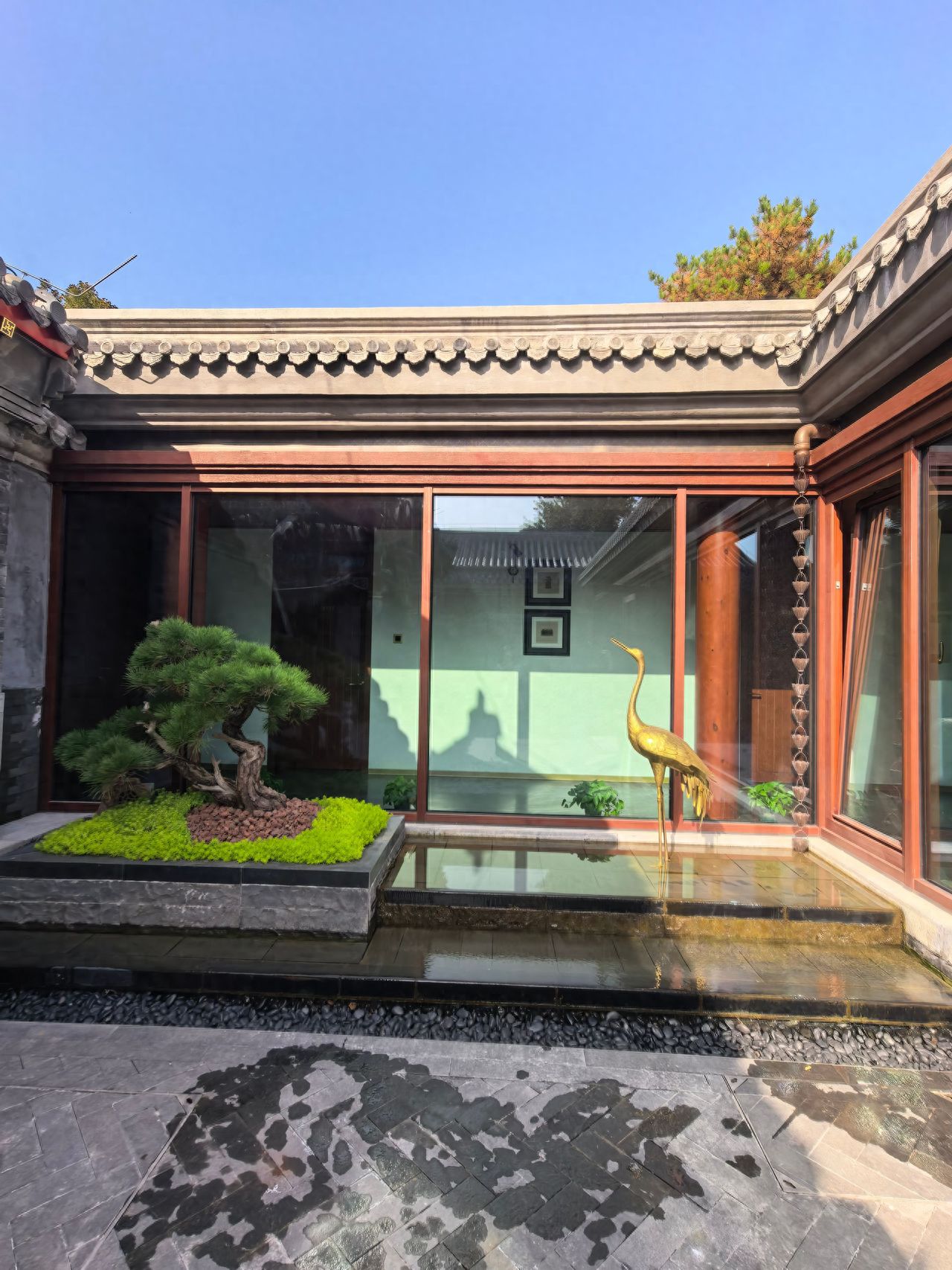 Photo by Beijing Xiangshan Park - capturing courtyard corridors, bonsai, and sculptures
