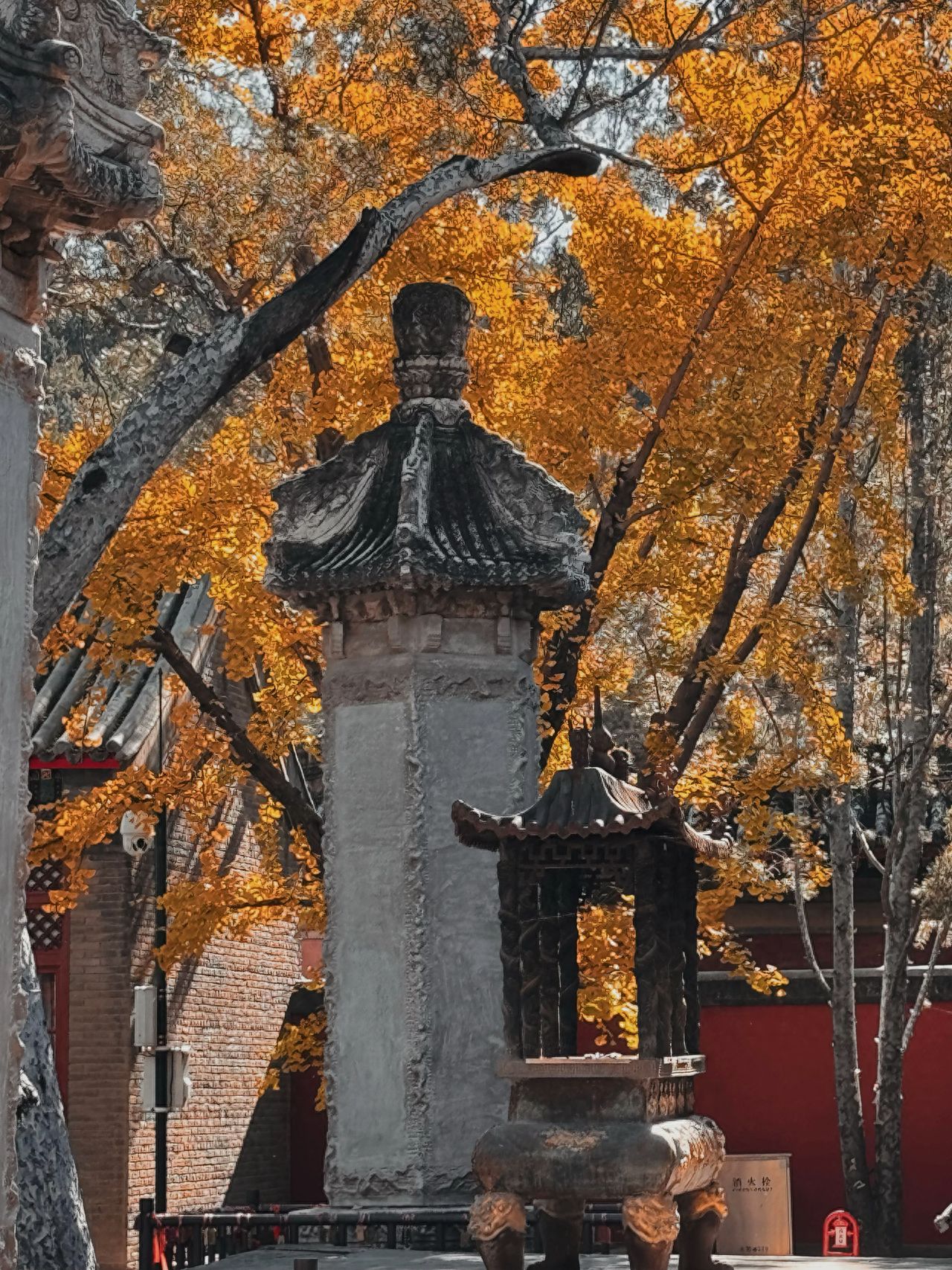 Photo by Beijing Xiangshan Park - Brick Wall and Red Wall Stele with Incense Burner