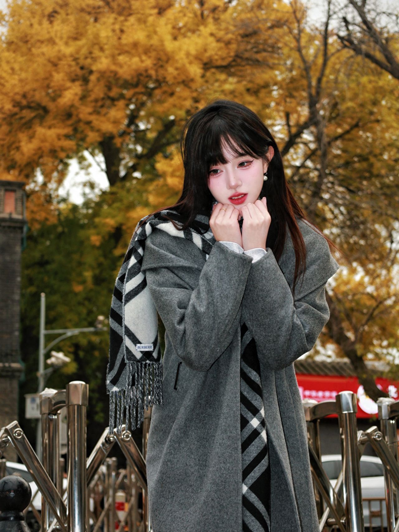 Photo by Take a photo with the railings and trees on Beijing's May 4th Street.