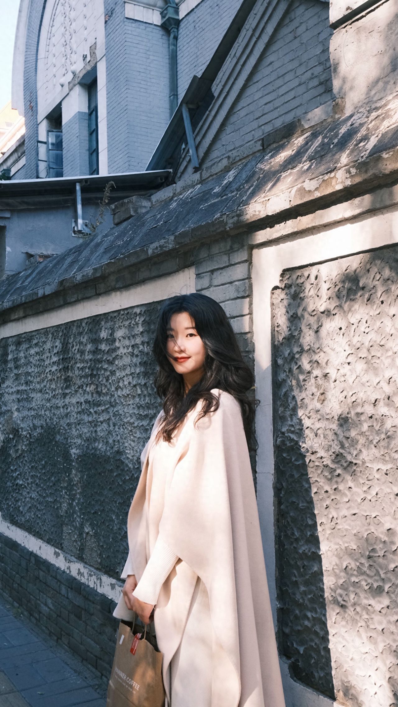 Photo by Beijing Dongjiaomin Alley – Photo with Gray Hutong Wall and Buildings