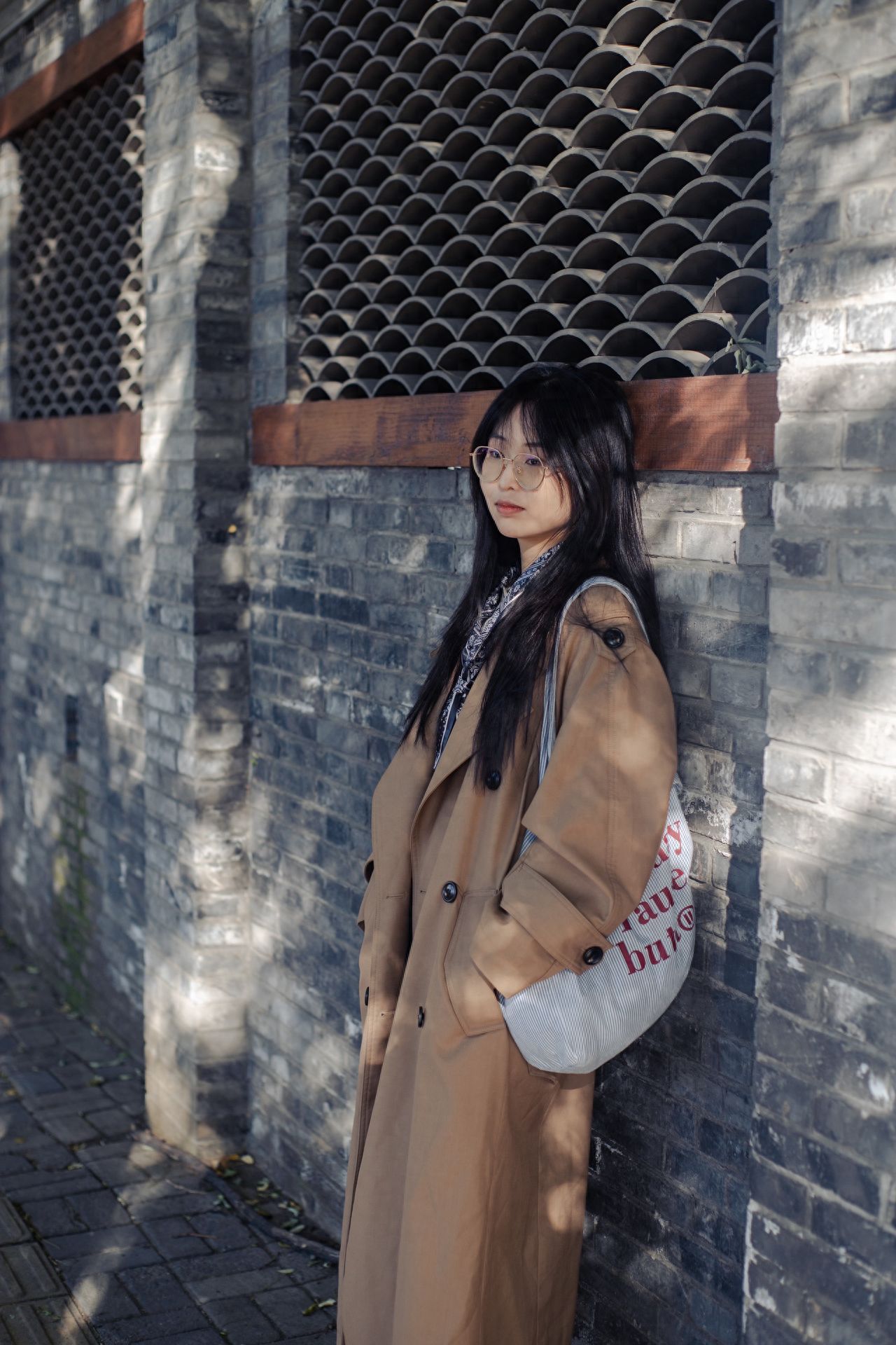 Photo by Dongjiaomin Alley – Photo with Brick Wall Window