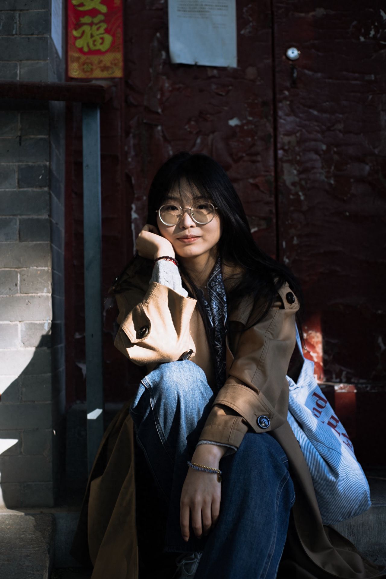 Photo by Dongjiaomin Alley – Photo with Red Gate and Brick Wall
