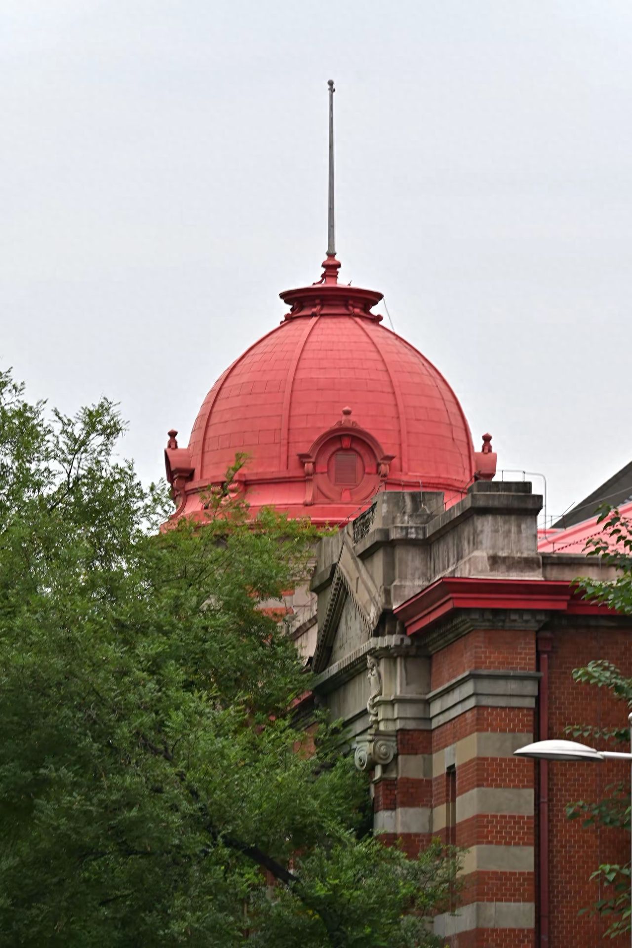 Former Site of the French Post Office - Greenery and Red Roof Architecture — photo spot in Former French Post Office  , China