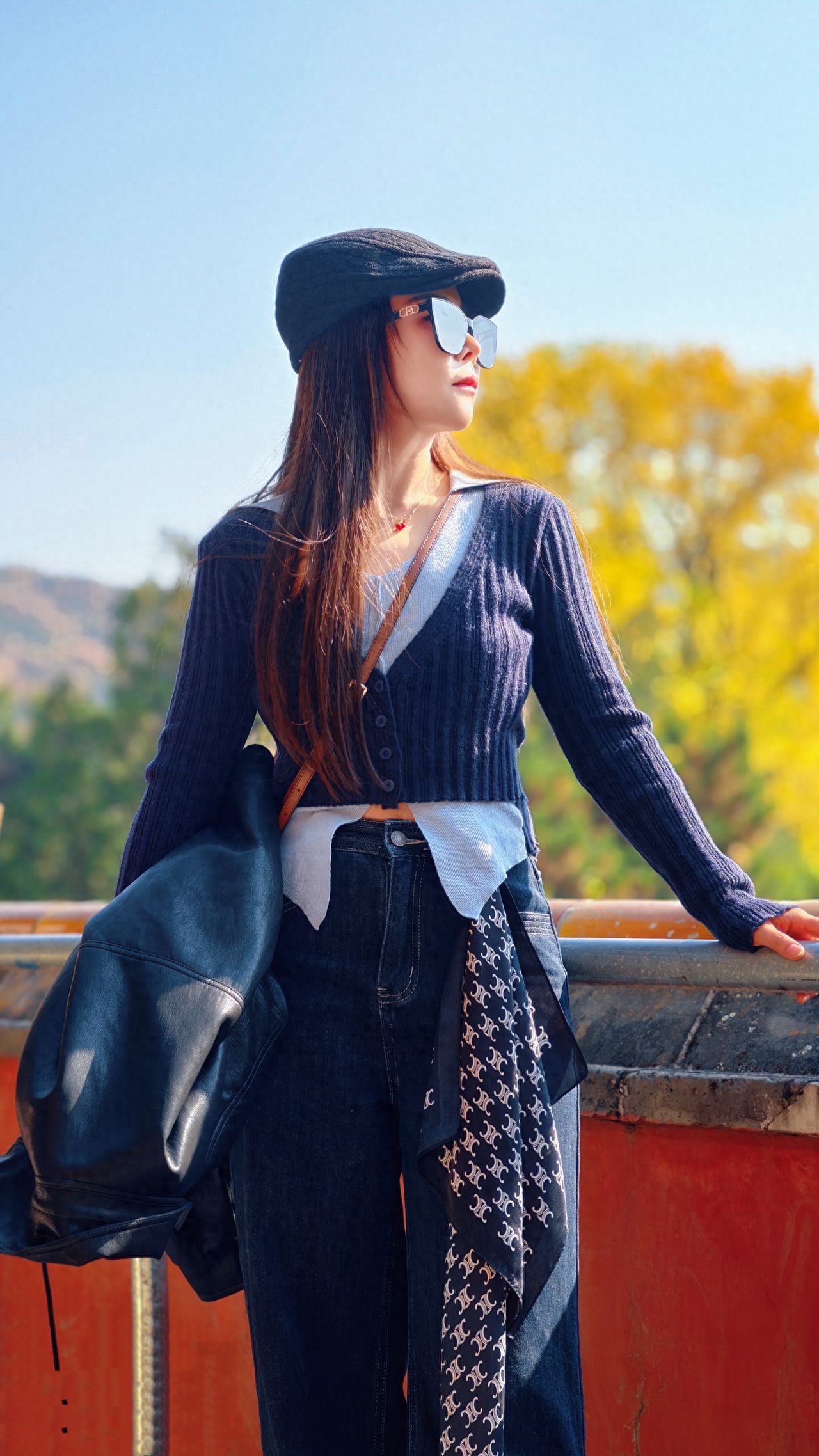 Photo by Tanzhe Temple - Take a photo with the red walls, railings, and autumn forest.