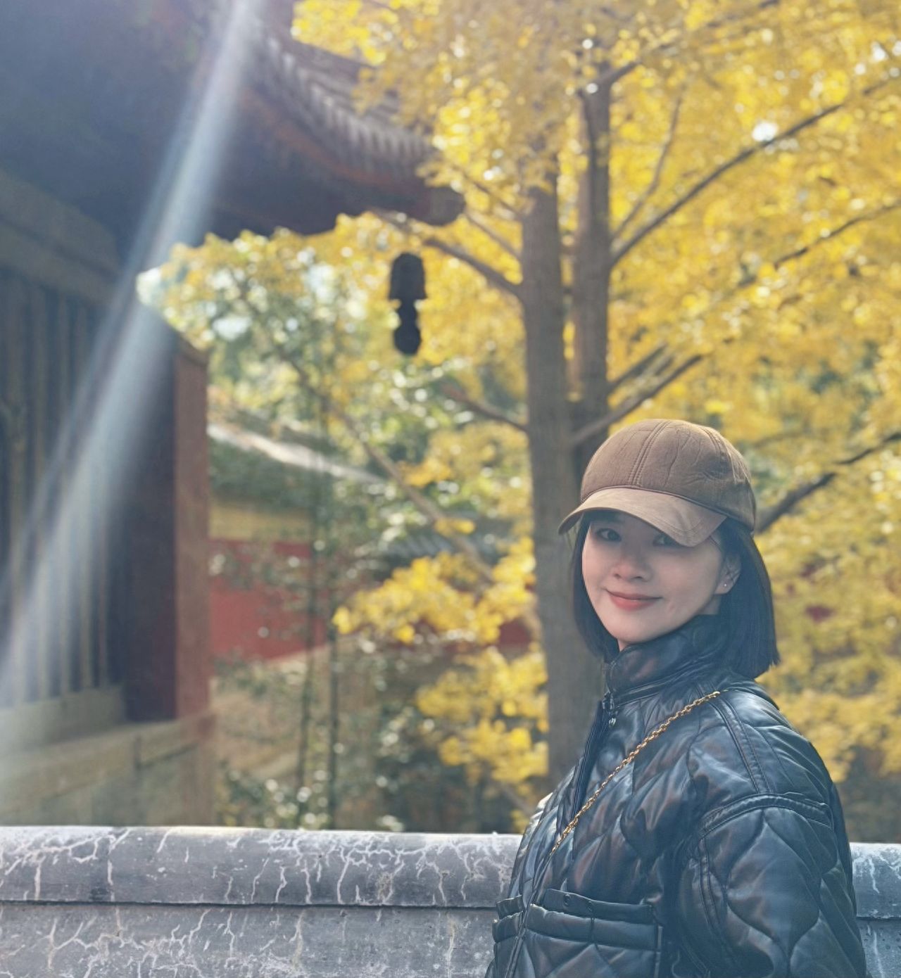 Photo by Beijing Xiangshan Park - Taking a photo with the Ginkgo Trees at the Stone Railing Architecture of Biyun Temple.