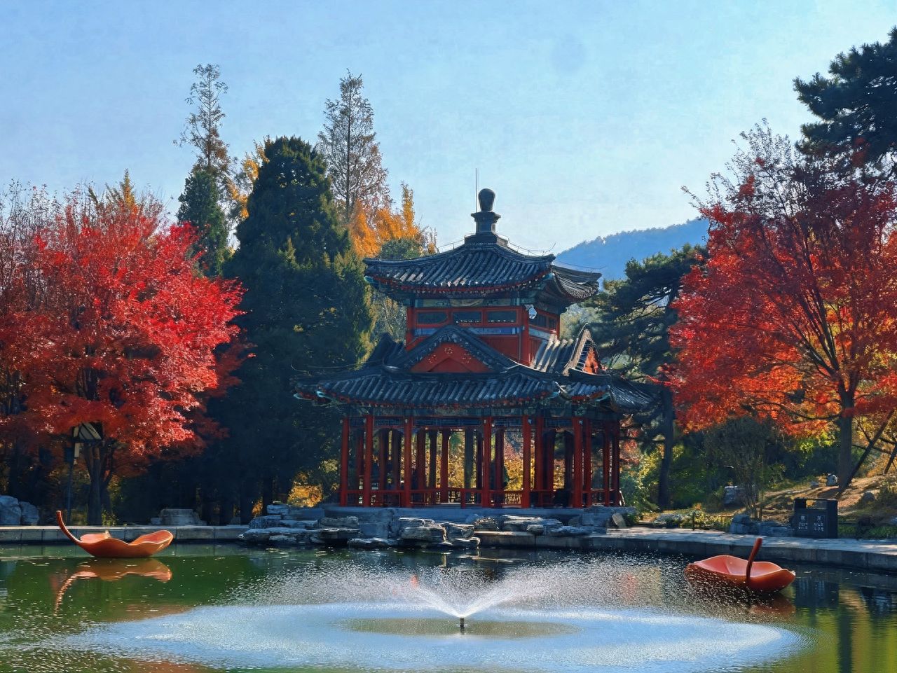 Photo by Beijing Fragrant Hills Park - Poolside Pavilion, Small Boats, and Red-Leaved Trees