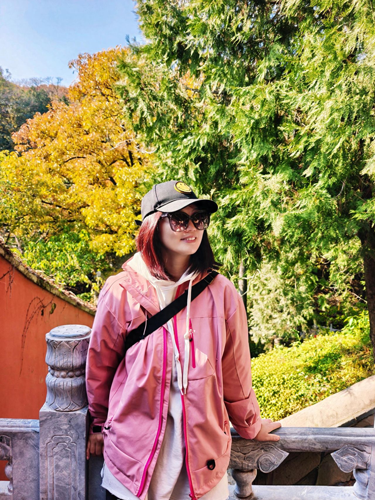 Photo by TanZhe Temple - Take a photo with the stone railings and red walls architecture.