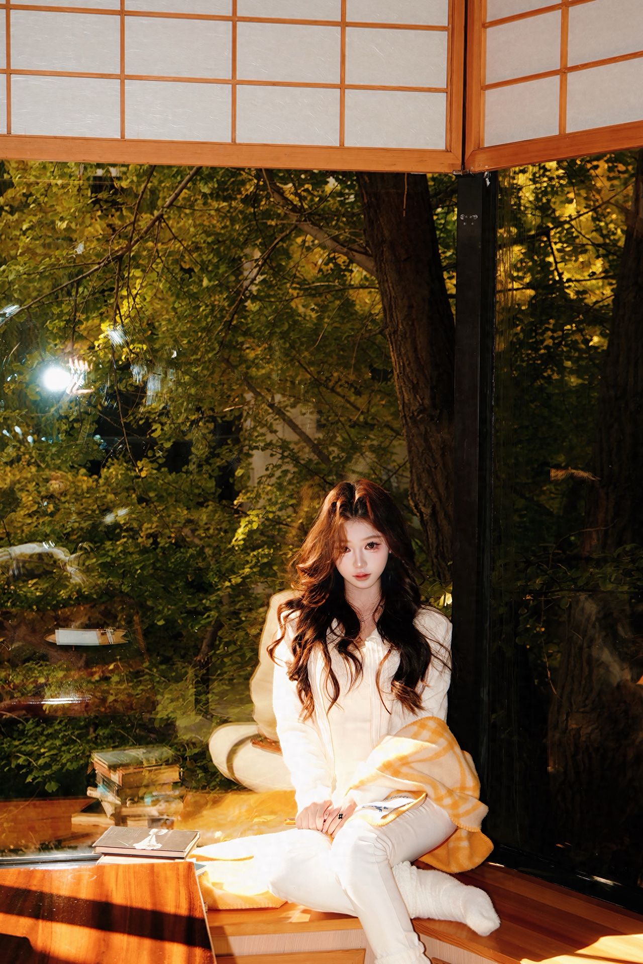 Capital Hotel - take a photo with the courtyard trees in front of the floor-to-ceiling windows. — photo spot in Capital Hotel  , China