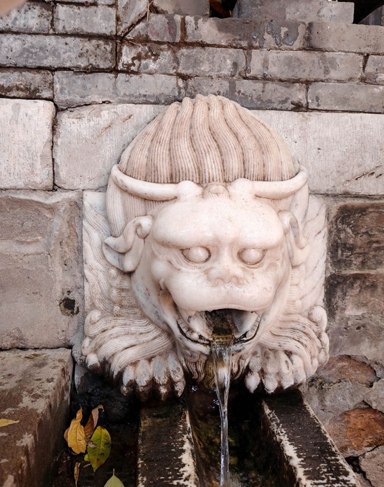 Photo by Tan Zhe Temple - Mythical Beast Stone Sculpture Water Outlet