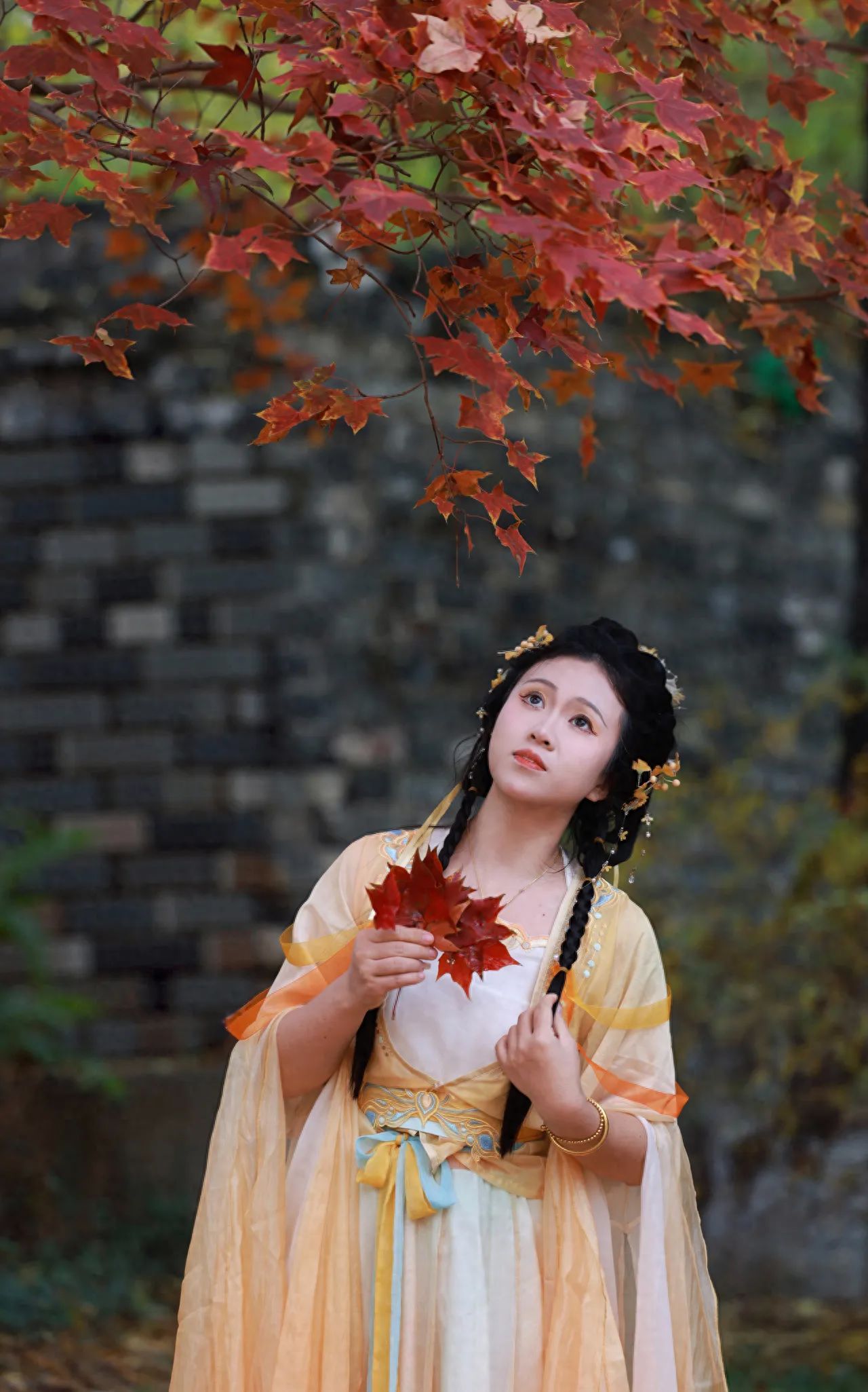 Photo by Beijing Ming City Wall Relics Park - Take a photo with red leaves and brick walls.