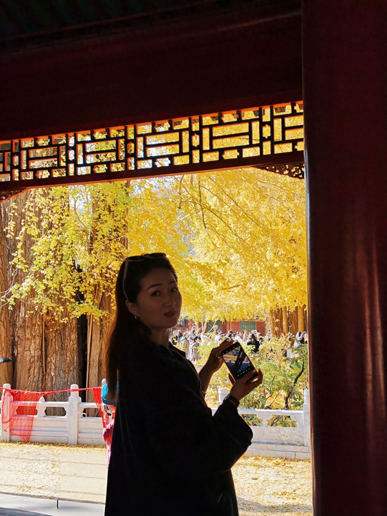 Photo by Take a photo with the door frame and railing ginkgo at Tanzhe Temple.
